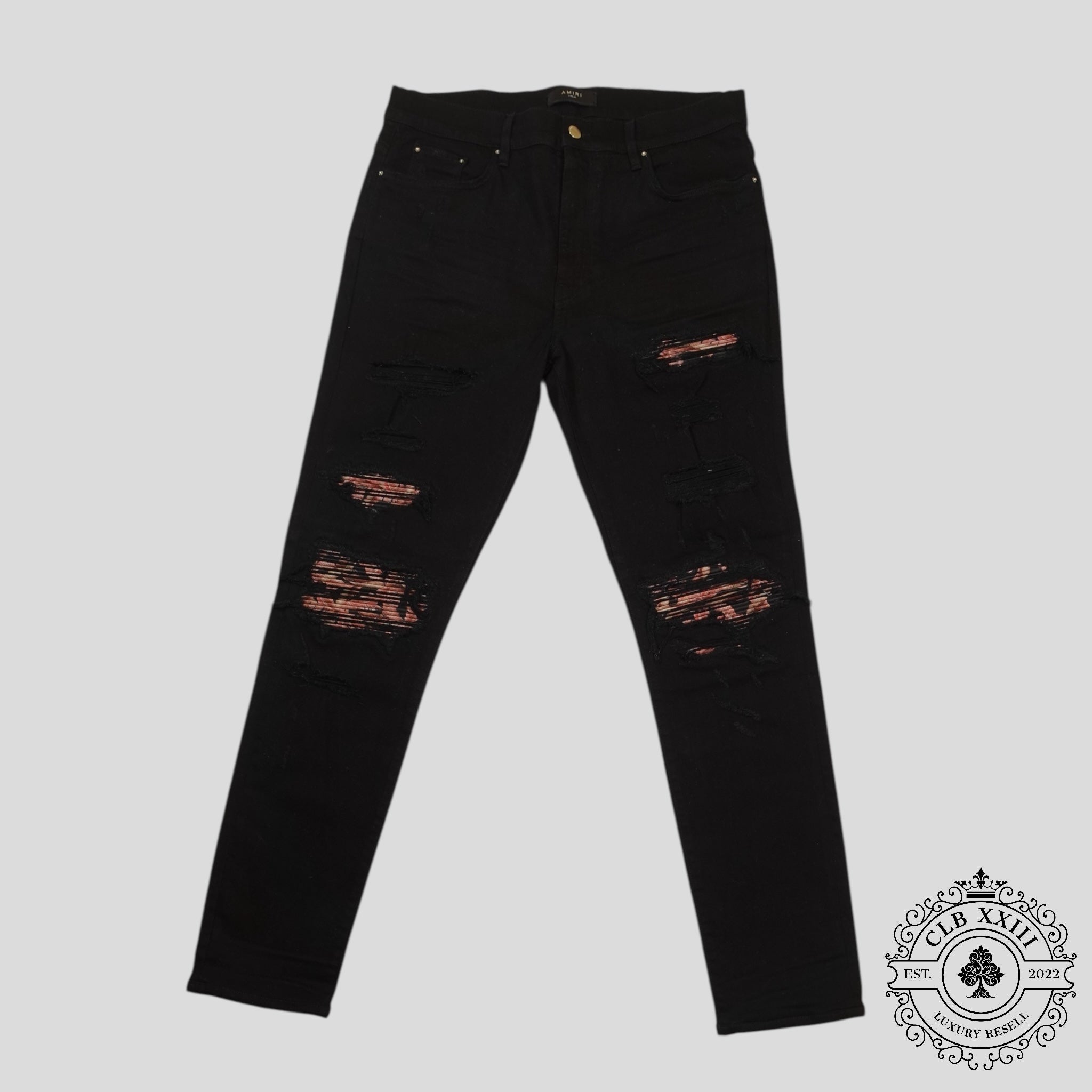 Amiri Banana Leaf Patch Thrasher Jeans in Black