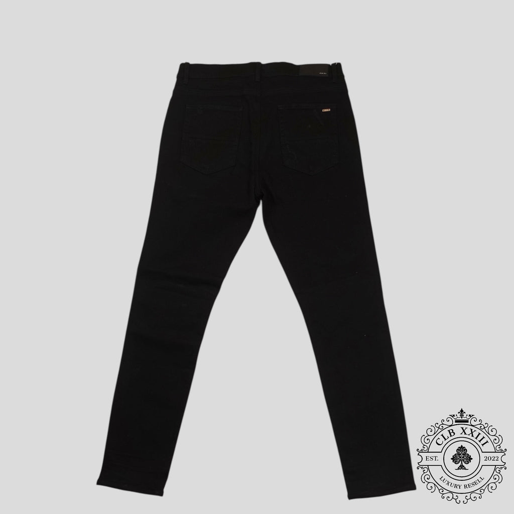Amiri Banana Leaf Patch Thrasher Jeans in Black